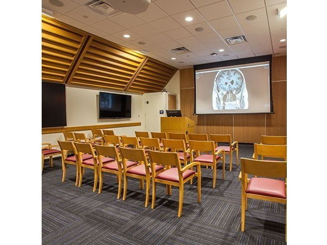 Draper Access V projection screen installed in a lecture hall